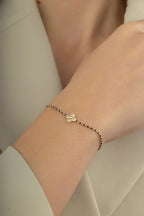 14 Ayar Siyah Boncuklu Çiçek Altın Bileklik